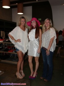 Phoebe Price with Sayro Jo Martinson (left) and Elle Cimmarusti (right) reppin the Planet Blue